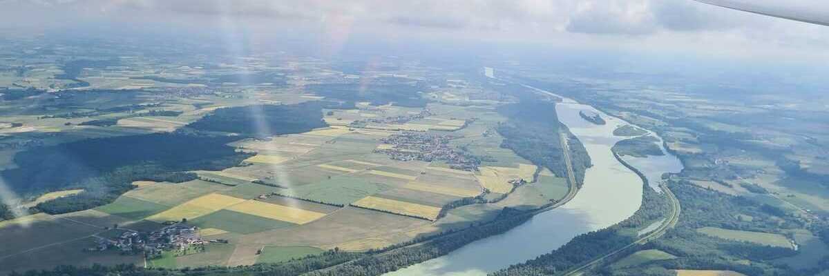 Flugwegposition um 08:29:28: Aufgenommen in der Nähe von Gemeinde Mühlheim am Inn, Mühlheim am Inn, Österreich in 1128 Meter